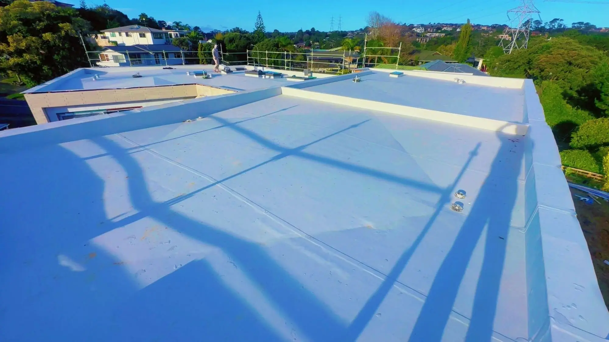 Large roof area prepared for a spray-applied protective coating