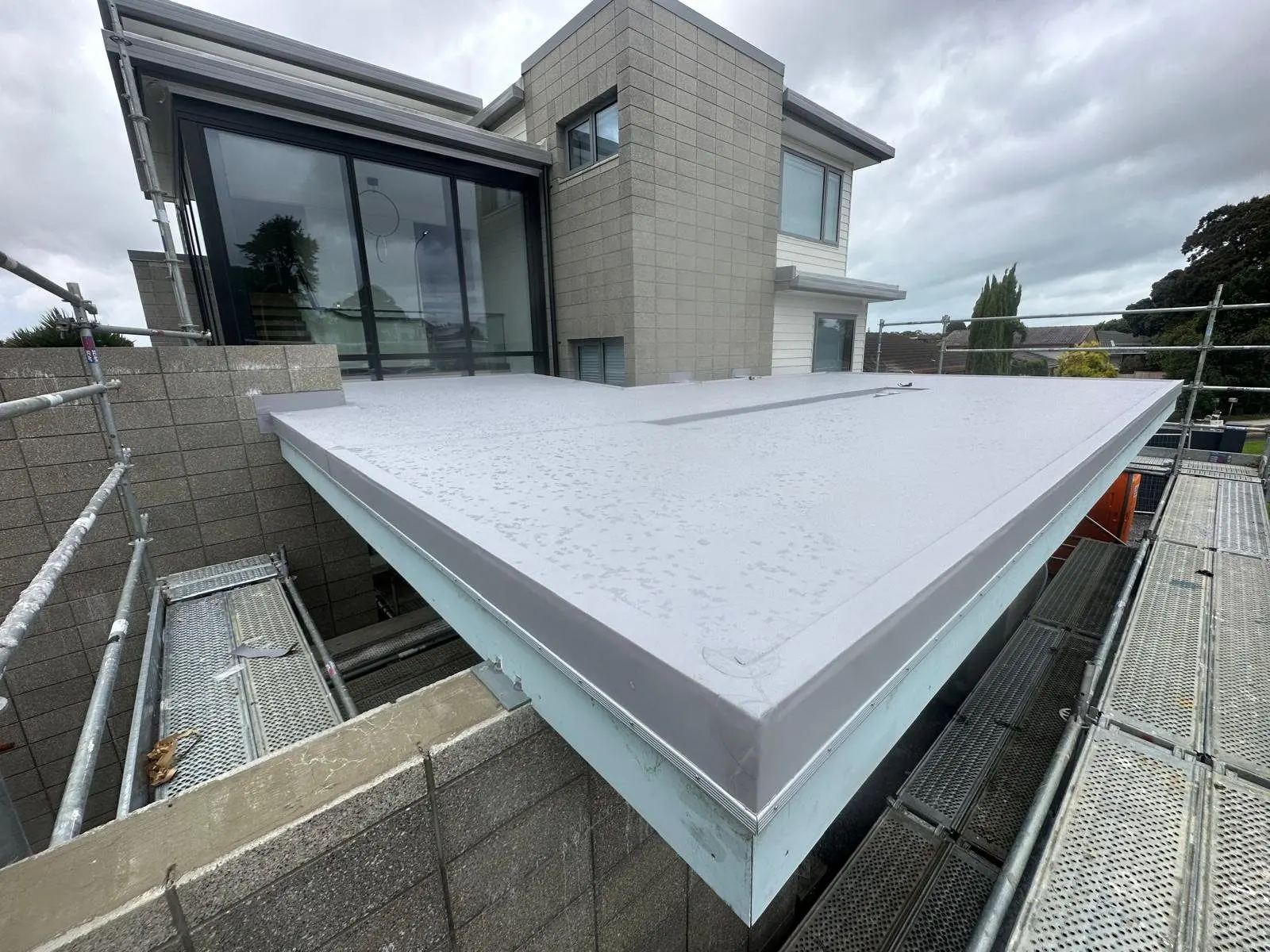 Membrane parapet cap on a modern Auckland home