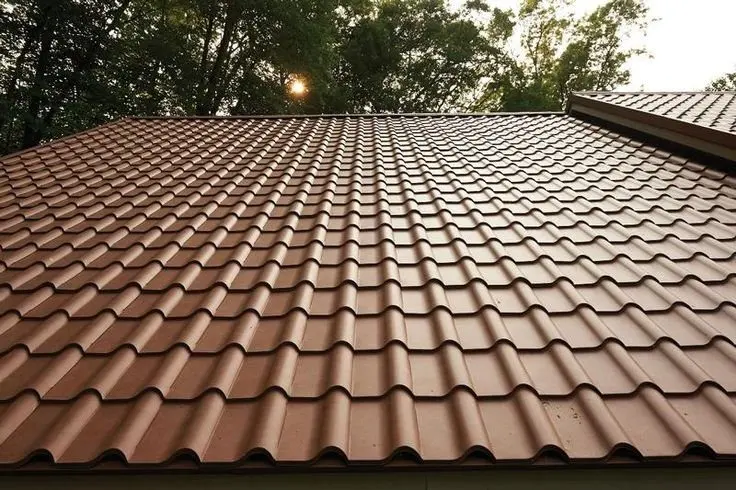 Terracotta-finish metal tile roof on an Auckland property