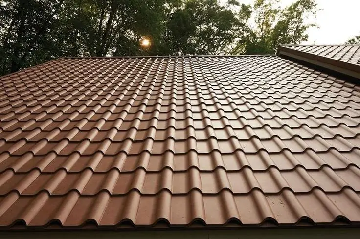 Terracotta-finish metal tile roof on an Auckland property