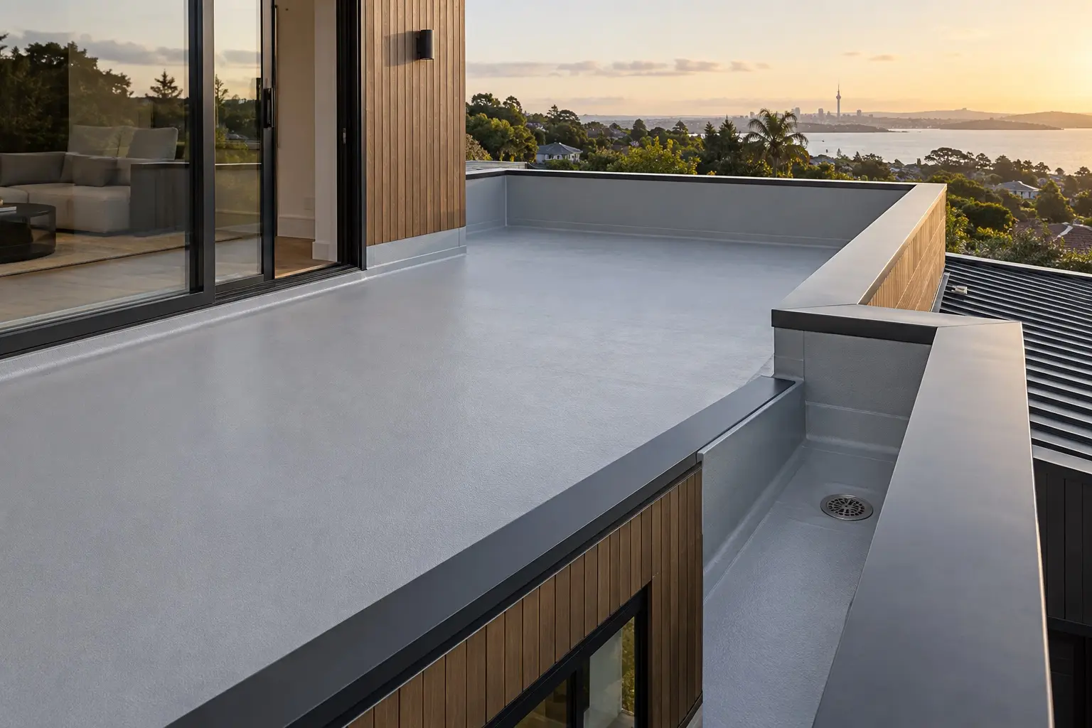 Waterproof membrane deck and internal gutter on an Auckland home