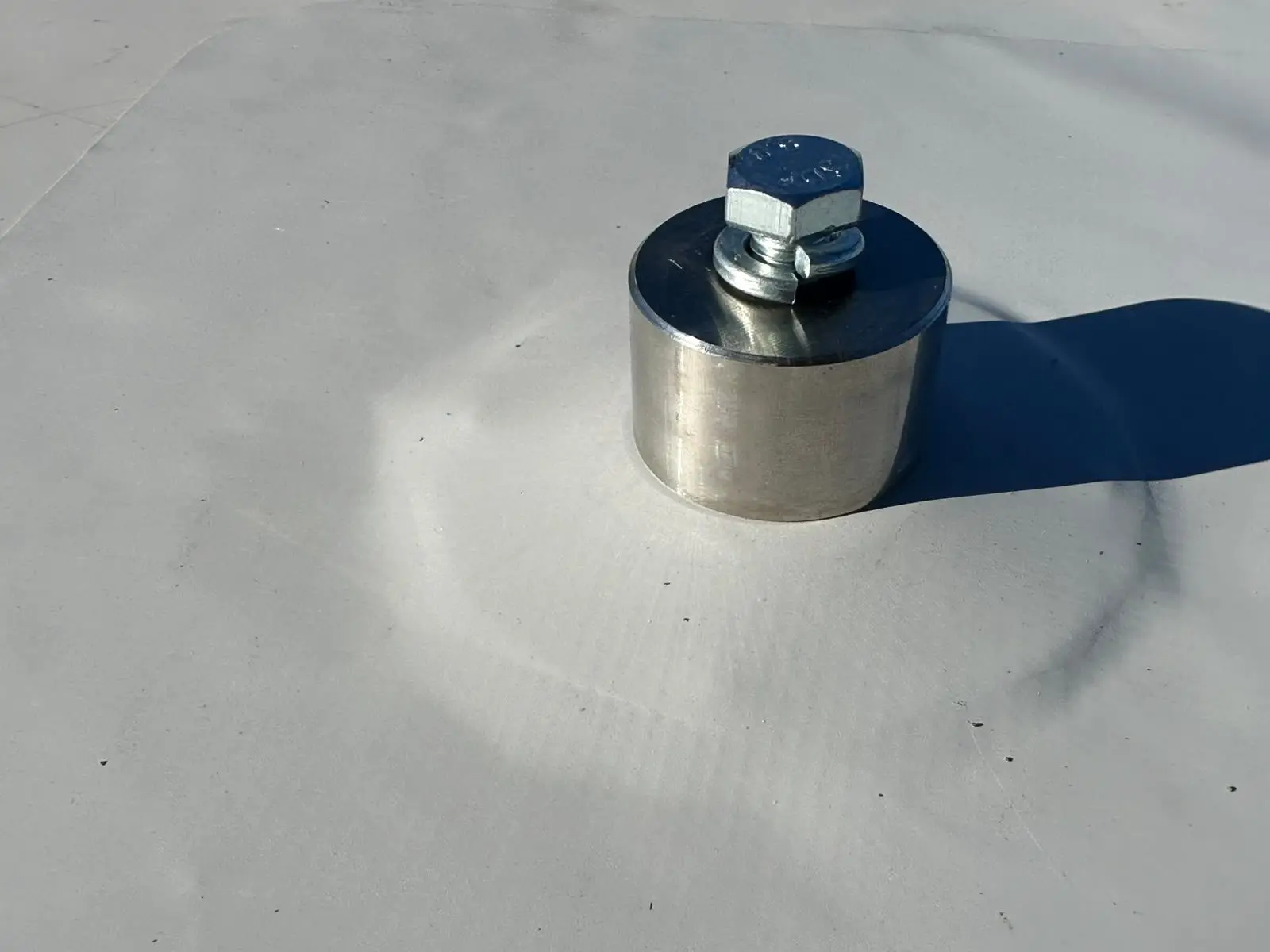 Stainless steel penetration collar welded into a TPO membrane roof