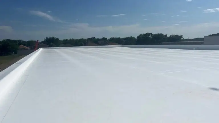 Coated roof surface with a reflective white finish